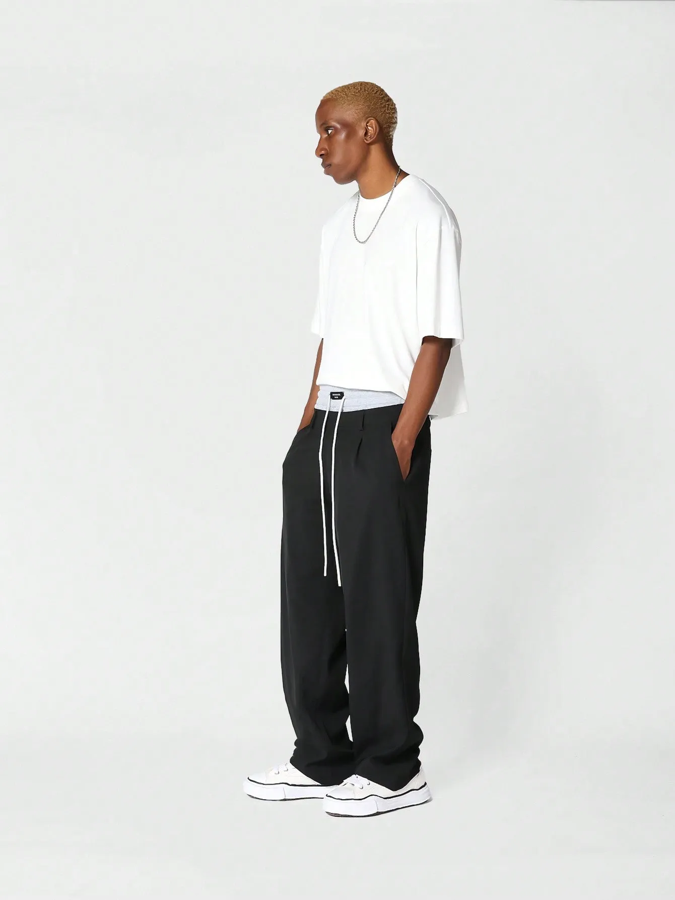 Loose Fit Pleated Trouser With Double Waistband